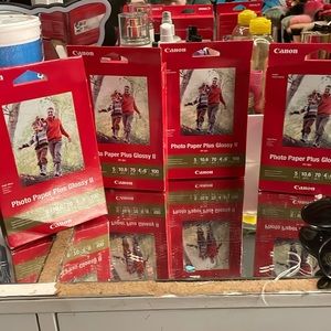 4 photo paper plus glossy $21.99 per package. 1 open. 100 papers per pack